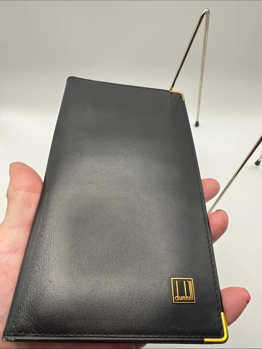 Dunhill Black Leather Folio Phone Case with Gold Corner and Logo Accents